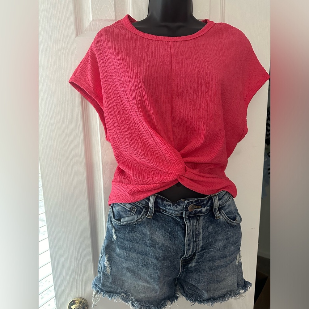 Lovely Melody pink creepy material type top with twist detail size small